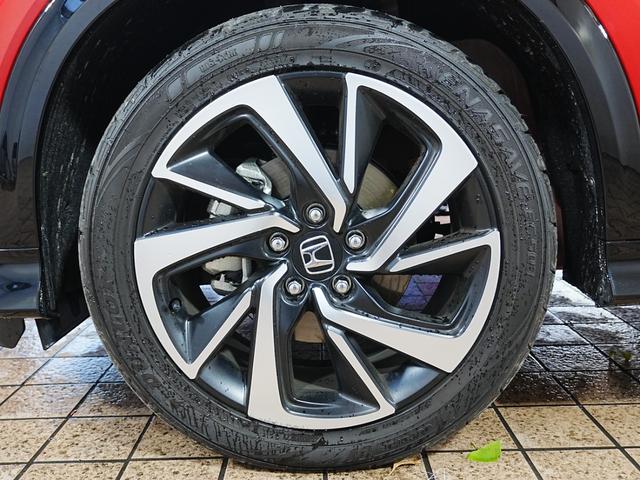 ヴェゼル ハイブリッドRS・ホンダセンシング 7インチメモリーナビ ハーフレザーシート 革巻きステアリング オートリトラミラー シートヒーター フルセグ BT SD バックカメラ ブレーキホールド パドルシフト LEDフォグ 社外前後ドラレコ(69枚目)