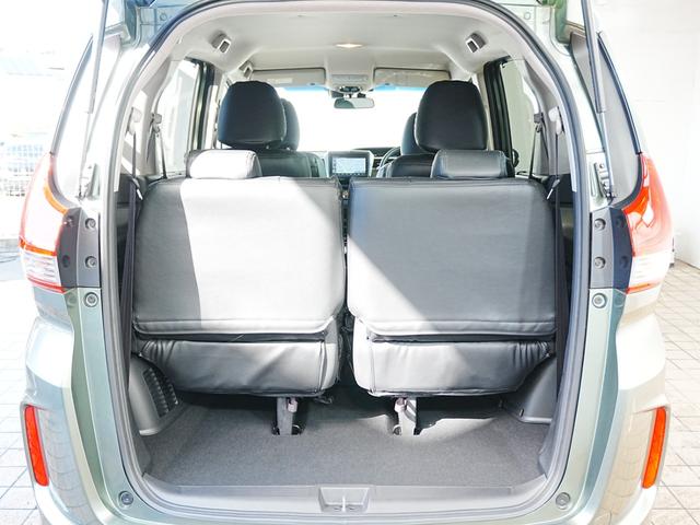 フリードハイブリッド ハイブリッド・Ｇブラックスタイル　ブラックスタイル専用装備　純正ナビフルセグＴＶ　左右パワースライドドア　シートヒーター　ＣＭＢＳ　ＡＣＣ　純正フロアマット　ステアスイッチ　クルコン　レーンキープ　黒革調シートカバー　Ｐスタート（13枚目）