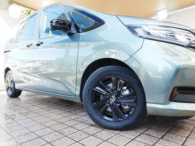 フリードハイブリッド ハイブリッド・Ｇブラックスタイル　ブラックスタイル専用装備　純正ナビフルセグＴＶ　左右パワースライドドア　シートヒーター　ＣＭＢＳ　ＡＣＣ　純正フロアマット　ステアスイッチ　クルコン　レーンキープ　黒革調シートカバー　Ｐスタート（73枚目）