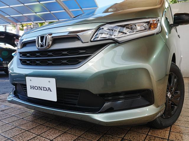 フリードハイブリッド ハイブリッド・Ｇブラックスタイル　ブラックスタイル専用装備　純正ナビフルセグＴＶ　左右パワースライドドア　シートヒーター　ＣＭＢＳ　ＡＣＣ　純正フロアマット　ステアスイッチ　クルコン　レーンキープ　黒革調シートカバー　Ｐスタート（74枚目）