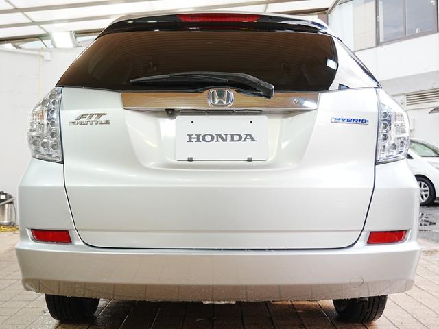 フィットシャトルハイブリッド ハイブリッド・スマートセレクション 純正ナビTV付き HIDヘッドライト クルコン バックカメラ 前後ドラレコ ハーフレザーシート ステアスイッチ 横滑り防止 純正マッド 純正バイザー トノカバー ECON AUTOライト(12枚目)