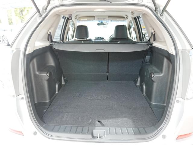 フィットシャトルハイブリッド ハイブリッド・スマートセレクション 純正ナビTV付き HIDヘッドライト クルコン バックカメラ 前後ドラレコ ハーフレザーシート ステアスイッチ 横滑り防止 純正マッド 純正バイザー トノカバー ECON AUTOライト(13枚目)