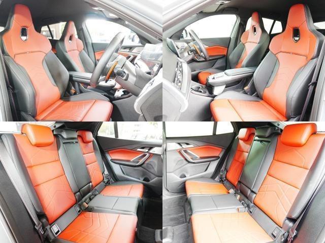 X2 M35i xDrive ディスプレイオーディオ 赤黒革シート パワーシート ハーマンカードン HUD 全方位カメラ ワイヤレス充電 純正前後ドラレコ シートヒーター ステアリングヒーター パワーバックドア アンビエントライト(4枚目)