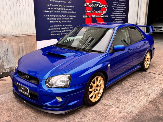 インプレッサ ＷＲＸ　ＳＴｉ　Ｅ型　フジツボマフラー　ＸＹＺ車高調　ＳＴＩフロントスポイラー　ＳＴＩタワーバー　ＳＴＩブースト計　純正ブレンボキャリパー　純正１７ＡＷ　ケンウッドナビ　前後ドラレコ　ＥＴＣ　タイミングベルト交換済（4枚目）