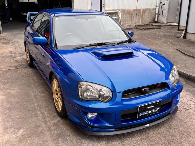 インプレッサ ＷＲＸ　ＳＴｉ　Ｅ型　フジツボマフラー　ＸＹＺ車高調　ＳＴＩフロントスポイラー　ＳＴＩタワーバー　ＳＴＩブースト計　純正ブレンボキャリパー　純正１７ＡＷ　ケンウッドナビ　前後ドラレコ　ＥＴＣ　タイミングベルト交換済（5枚目）