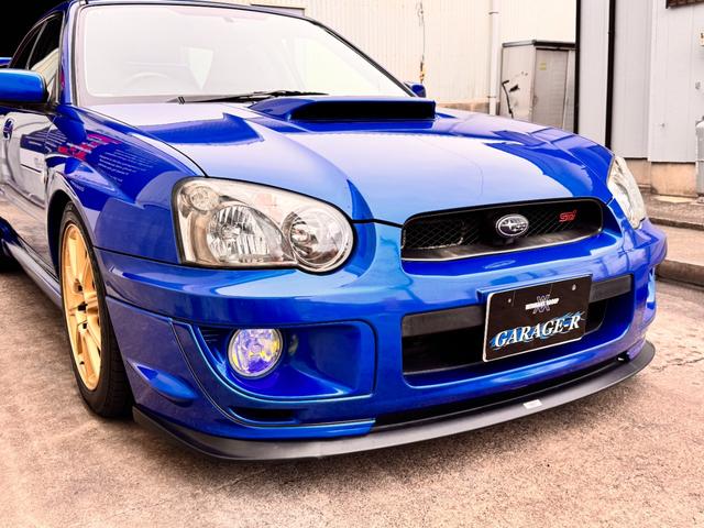 インプレッサ ＷＲＸ　ＳＴｉ　Ｅ型　フジツボマフラー　ＸＹＺ車高調　ＳＴＩフロントスポイラー　ＳＴＩタワーバー　ＳＴＩブースト計　純正ブレンボキャリパー　純正１７ＡＷ　ケンウッドナビ　前後ドラレコ　ＥＴＣ　タイミングベルト交換済（7枚目）
