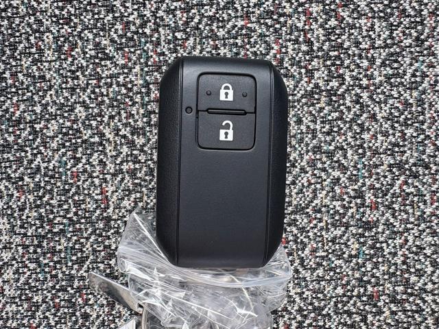 スペーシア ハイブリッドＧ　届出済未使用車　スズキセーフティサポート　横滑り防止装置　両側スライドドア　オートエアコン　オートライト　プッシュスタート　スマートキー　パワーウインドウ　アイドリングストップ　禁煙車　修復歴無（29枚目）