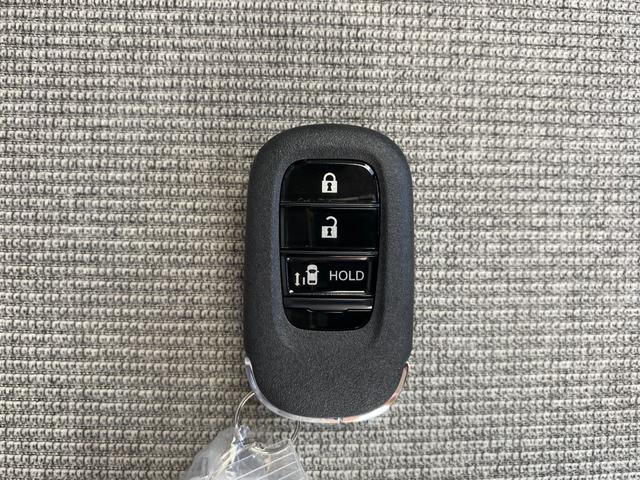 N-BOX ベースグレード 届出済未使用車 衝突軽減ブレーキ 両側スライドドア LEDヘッドライト スマートキー プッシュスタート オートエアコン アイドリングストップ 禁煙車 パワーステアリング パワーウインドウ 修復歴無(29枚目)