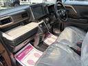 ハイブリッドＧ　届出済未使用車　スズキセーフティサポート　横滑り防止装置　両側スライドドア　オートエアコン　オートライト　プッシュスタート　スマートキー　パワーウインドウ　アイドリングストップ　禁煙車　修復歴無（14枚目）