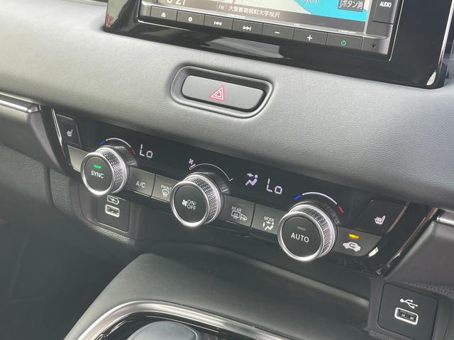 ヴェゼル ｅ：ＨＥＶＺ　ホンダコネクト　ホンダセンシング　ステアリングヒーター　前席シートヒーター　ＥＴＣ　クルーズコントロール　ハンズフリーアクセスパワーテールゲート（予約クローズ機能付）　ブラインドスポットインフォメーシ（25枚目）