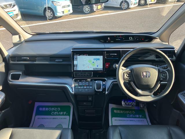 ステップワゴンスパーダ スパーダハイブリッド　Ｇ・ＥＸ　ホンダセンシング　純正ナビ・バックカメラ・シートヒーター・前後ドライブレコーダー・クルーズコントロール・両側パワースライドドア・ＥＴＣ・オートライト・Ｐセンサー・衝突軽減システム・脱線防止機能・純正フリップダウン（4枚目）