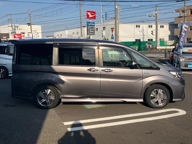 ステップワゴンスパーダ スパーダハイブリッド　Ｇ・ＥＸ　ホンダセンシング　純正ナビ・バックカメラ・シートヒーター・前後ドライブレコーダー・クルーズコントロール・両側パワースライドドア・ＥＴＣ・オートライト・Ｐセンサー・衝突軽減システム・脱線防止機能・純正フリップダウン（11枚目）