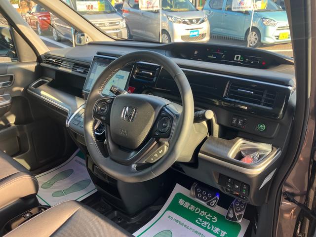 ステップワゴンスパーダ スパーダハイブリッド　Ｇ・ＥＸ　ホンダセンシング　純正ナビ・バックカメラ・シートヒーター・前後ドライブレコーダー・クルーズコントロール・両側パワースライドドア・ＥＴＣ・オートライト・Ｐセンサー・衝突軽減システム・脱線防止機能・純正フリップダウン（49枚目）