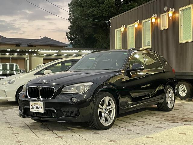 Ｘ１ ｓＤｒｉｖｅ　１８ｉ　Ｍスポーツ　パーキングサポートＰＫＧ・車検２年・禁煙・バックカメラ・純正ナビ・Ｂｌｕｅｔｏｏｔｈ・コーナーセンサー・プッシュスタート・ＨＩＤ・スマートキー・ＥＴＣ（11枚目）