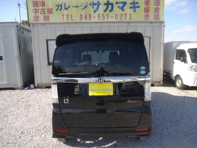 N-BOXカスタム G SSパッケージ スマートキー インターナビTV Bluetooth ETC 両側電動スライドドア ディスチャージヘッドライト フォグランプ 純正14インチアルミ バックカメラ リアスポイラー 走行距離無制限1年保証(3枚目)