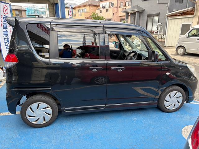 ソリオ Gリミテッド ワンセグナビ 左側パワースライドドア プッシュスタート スマートキー オートエアコン 電動格納ドアミラー ウォークスルー ETC 盗難防止装置 運転席・助手席エアバッグ ABS(4枚目)