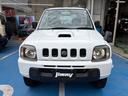 ジムニー XG 4WD CDオーディオ ETC ABS PS PW 衝突安全ボディ キーレスエントリー 運転席エアバッグ 助手席エアバッグ フルフラット シートカバー 社外ホワイトレタータイヤ&ホイール 中古車画像_2