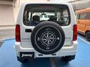 ジムニー XG 4WD CDオーディオ ETC ABS PS PW 衝突安全ボディ キーレスエントリー 運転席エアバッグ 助手席エアバッグ フルフラット シートカバー 社外ホワイトレタータイヤ&ホイール 中古車画像_3