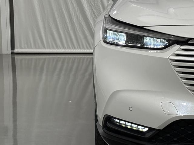 ヴェゼル ｅ：ＨＥＶＺ　純正メモリーナビ　フルセグＴＶ　バックカメラ　前後ドラレコ　ＥＴＣ２．０　サイドカーテンエアバック　シートヒーター　パドルシフト　ハンズフリーアクセスパワーテールゲート　横滑り防止装置　１オナ　スマキ（2枚目）