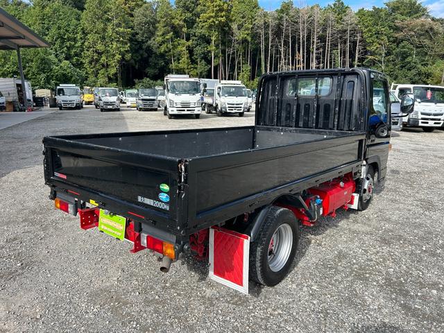 キャンター 全低床　カスタム　１年保証付き　２ｔ　ＡＴ車　ディーゼルターボ　両側電動格納ミラー　荷台内寸　長さ３１００ｍｍ　幅１６００ｍｍ　ナビ　ＴＶ　Ｂｌｕｅｔｏｏｔｈ接続　２トン　２トントラック　平ボディ　荷台鉄板可（5枚目）