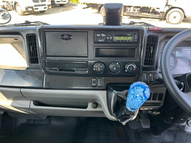 キャンター 全低床ダンプ　１年保証付き　２ｔ　強化ダンプ　ＭＴ車　電動格納ミラー　コボレーン　荷台内寸　長さ３０５０ｍｍ　幅１５９０ｍｍ　フロントフォグランプ　２トン　２トンダンプ　２ｔダンプ　ディーゼルターボ　横滑り防止装置（20枚目）