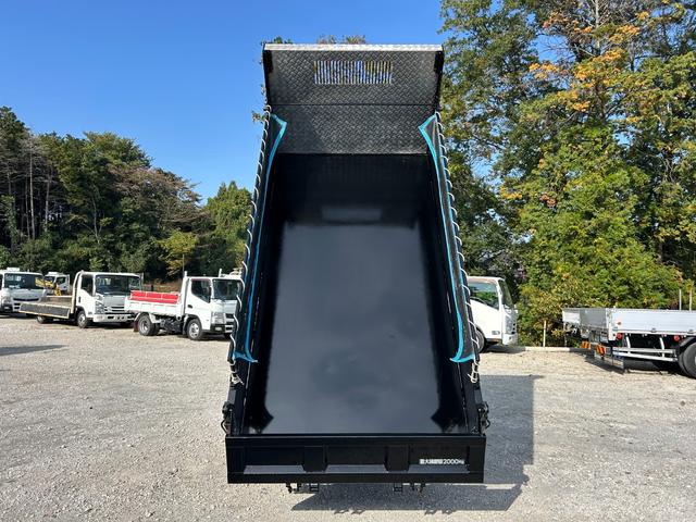 キャンター 全低床ダンプ　１年保証付き　２ｔ　強化ダンプ　ＭＴ車　電動格納ミラー　コボレーン　荷台内寸　長さ３０５０ｍｍ　幅１５９０ｍｍ　フロントフォグランプ　２トン　２トンダンプ　２ｔダンプ　ディーゼルターボ　横滑り防止装置（53枚目）