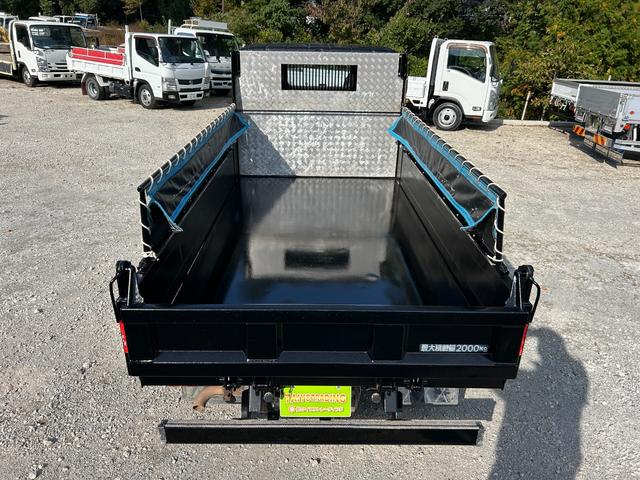 キャンター 全低床ダンプ　１年保証付き　２ｔ　強化ダンプ　ＭＴ車　電動格納ミラー　コボレーン　荷台内寸　長さ３０５０ｍｍ　幅１５９０ｍｍ　フロントフォグランプ　２トン　２トンダンプ　２ｔダンプ　ディーゼルターボ　横滑り防止装置（56枚目）