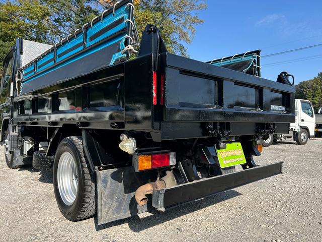 キャンター 全低床ダンプ　１年保証付き　２ｔ　強化ダンプ　ＭＴ車　電動格納ミラー　コボレーン　荷台内寸　長さ３０５０ｍｍ　幅１５９０ｍｍ　フロントフォグランプ　２トン　２トンダンプ　２ｔダンプ　ディーゼルターボ　横滑り防止装置（72枚目）