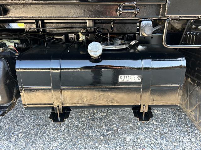 キャンター 全低床ダンプ　１年保証付き　２ｔ　強化ダンプ　ＭＴ車　電動格納ミラー　コボレーン　荷台内寸　長さ３０５０ｍｍ　幅１５９０ｍｍ　フロントフォグランプ　２トン　２トンダンプ　２ｔダンプ　ディーゼルターボ　横滑り防止装置（79枚目）