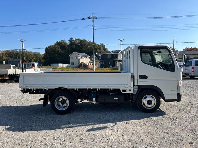 キャンター 全低床　１年保証付き　禁煙車　２ｔ　ＡＴ車　ディーゼルターボ　電動格納ミラー　荷台内寸　長さ３１００ｍｍ　幅１６００ｍｍ　荷台木製　坂道発進補助装置付　２トン　２トントラック　標準　平ボディ　荷台鉄板張り可能（4枚目）