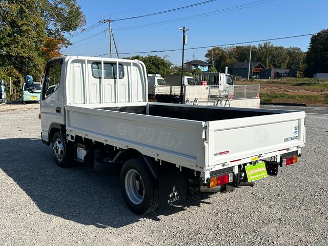 キャンター 全低床　１年保証付き　禁煙車　２ｔ　ＡＴ車　ディーゼルターボ　電動格納ミラー　荷台内寸　長さ３１００ｍｍ　幅１６００ｍｍ　荷台木製　坂道発進補助装置付　２トン　２トントラック　標準　平ボディ　荷台鉄板張り可能（7枚目）