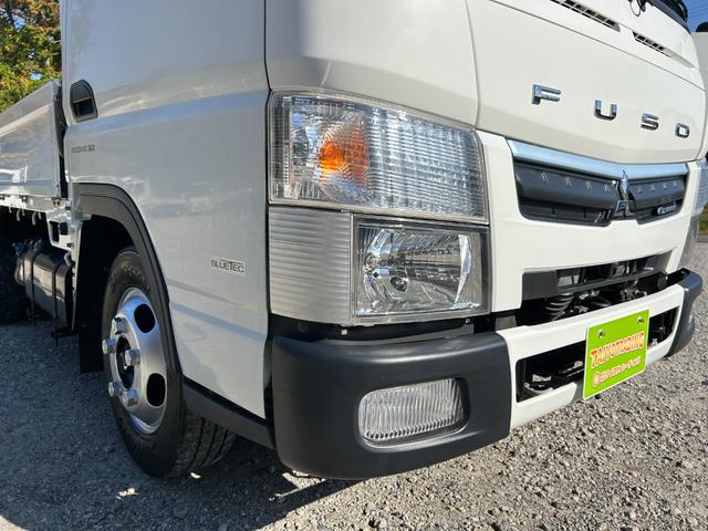 キャンター 全低床　１年保証付き　禁煙車　２ｔ　ＡＴ車　ディーゼルターボ　電動格納ミラー　荷台内寸　長さ３１００ｍｍ　幅１６００ｍｍ　荷台木製　坂道発進補助装置付　２トン　２トントラック　標準　平ボディ　荷台鉄板張り可能（55枚目）