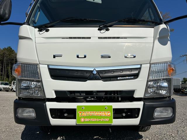 キャンター 全低床　１年保証付き　禁煙車　２ｔ　ＡＴ車　ディーゼルターボ　電動格納ミラー　荷台内寸　長さ３１００ｍｍ　幅１６００ｍｍ　荷台木製　坂道発進補助装置付　２トン　２トントラック　標準　平ボディ　荷台鉄板張り可能（58枚目）