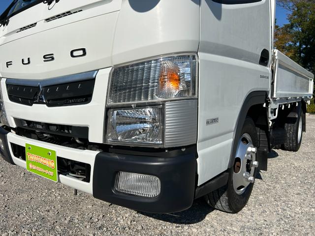 キャンター 全低床　１年保証付き　禁煙車　２ｔ　ＡＴ車　ディーゼルターボ　電動格納ミラー　荷台内寸　長さ３１００ｍｍ　幅１６００ｍｍ　荷台木製　坂道発進補助装置付　２トン　２トントラック　標準　平ボディ　荷台鉄板張り可能（61枚目）