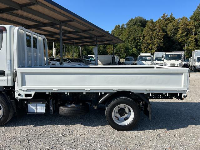 キャンター 全低床　１年保証付き　禁煙車　２ｔ　ＡＴ車　ディーゼルターボ　電動格納ミラー　荷台内寸　長さ３１００ｍｍ　幅１６００ｍｍ　荷台木製　坂道発進補助装置付　２トン　２トントラック　標準　平ボディ　荷台鉄板張り可能（64枚目）