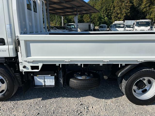 キャンター 全低床　１年保証付き　禁煙車　２ｔ　ＡＴ車　ディーゼルターボ　電動格納ミラー　荷台内寸　長さ３１００ｍｍ　幅１６００ｍｍ　荷台木製　坂道発進補助装置付　２トン　２トントラック　標準　平ボディ　荷台鉄板張り可能（65枚目）