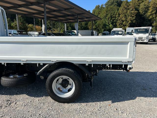 キャンター 全低床　１年保証付き　禁煙車　２ｔ　ＡＴ車　ディーゼルターボ　電動格納ミラー　荷台内寸　長さ３１００ｍｍ　幅１６００ｍｍ　荷台木製　坂道発進補助装置付　２トン　２トントラック　標準　平ボディ　荷台鉄板張り可能（67枚目）