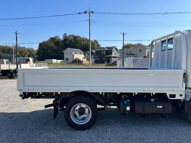 キャンター 全低床　１年保証付き　禁煙車　２ｔ　ＡＴ車　ディーゼルターボ　電動格納ミラー　荷台内寸　長さ３１００ｍｍ　幅１６００ｍｍ　荷台木製　坂道発進補助装置付　２トン　２トントラック　標準　平ボディ　荷台鉄板張り可能（74枚目）