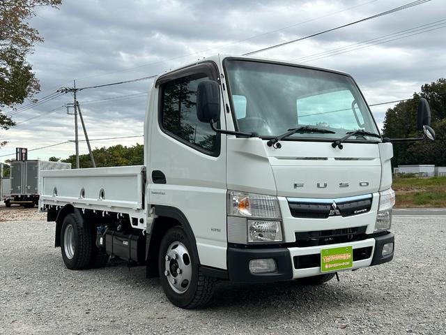 キャンター 全低床　１年保証付き　２ｔ　ＡＴ車　ディーゼルターボ　電動格納ミラー　荷台内寸長さ３１００ｍｍ　幅１６００ｍｍ　ナビ　ＴＶ　ＥＴＣ　坂道発進補助装置付　２トン　２トントラック　平ボディ　荷台鉄板張り　キーレス（3枚目）