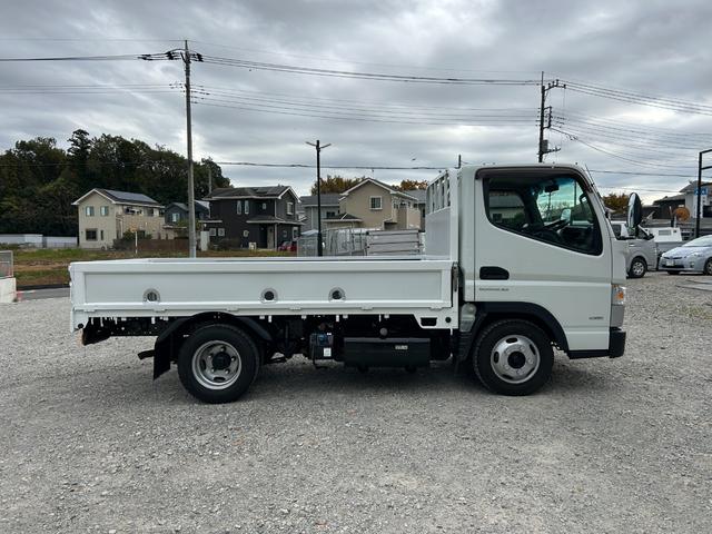 キャンター 全低床　１年保証付き　２ｔ　ＡＴ車　ディーゼルターボ　電動格納ミラー　荷台内寸長さ３１００ｍｍ　幅１６００ｍｍ　ナビ　ＴＶ　ＥＴＣ　坂道発進補助装置付　２トン　２トントラック　平ボディ　荷台鉄板張り　キーレス（4枚目）