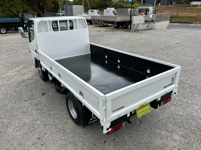 キャンター 全低床　１年保証付き　２ｔ　ＡＴ車　ディーゼルターボ　電動格納ミラー　荷台内寸長さ３１００ｍｍ　幅１６００ｍｍ　ナビ　ＴＶ　ＥＴＣ　坂道発進補助装置付　２トン　２トントラック　平ボディ　荷台鉄板張り　キーレス（48枚目）