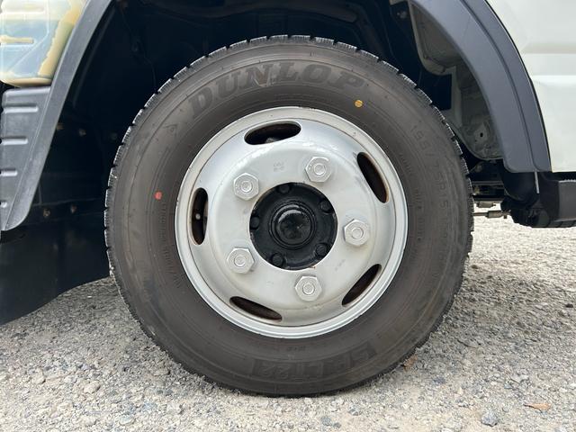 キャンター 全低床　１年保証付き　２ｔ　ＡＴ車　ディーゼルターボ　電動格納ミラー　荷台内寸長さ３１００ｍｍ　幅１６００ｍｍ　ナビ　ＴＶ　ＥＴＣ　坂道発進補助装置付　２トン　２トントラック　平ボディ　荷台鉄板張り　キーレス（54枚目）