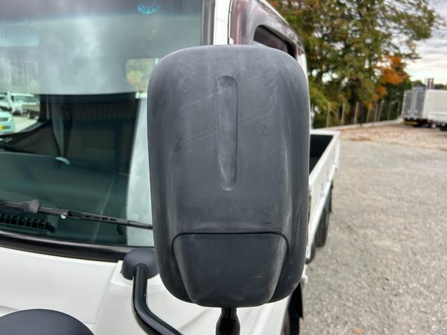 キャンター 全低床　１年保証付き　２ｔ　ＡＴ車　ディーゼルターボ　電動格納ミラー　荷台内寸長さ３１００ｍｍ　幅１６００ｍｍ　ナビ　ＴＶ　ＥＴＣ　坂道発進補助装置付　２トン　２トントラック　平ボディ　荷台鉄板張り　キーレス（57枚目）