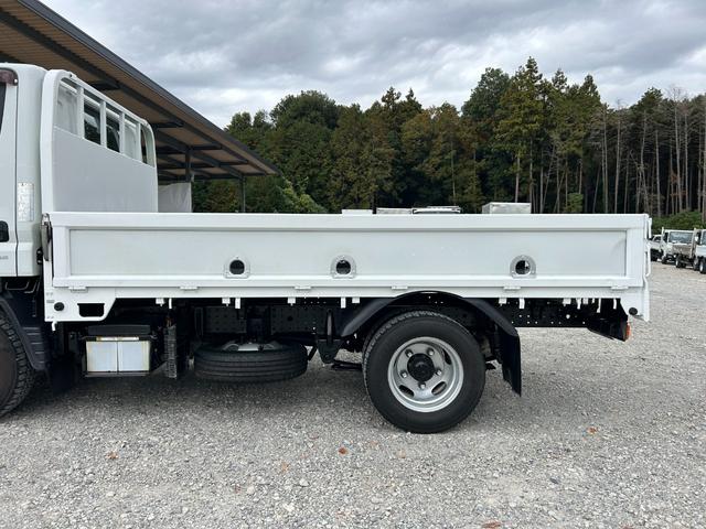 キャンター 全低床　１年保証付き　２ｔ　ＡＴ車　ディーゼルターボ　電動格納ミラー　荷台内寸長さ３１００ｍｍ　幅１６００ｍｍ　ナビ　ＴＶ　ＥＴＣ　坂道発進補助装置付　２トン　２トントラック　平ボディ　荷台鉄板張り　キーレス（62枚目）