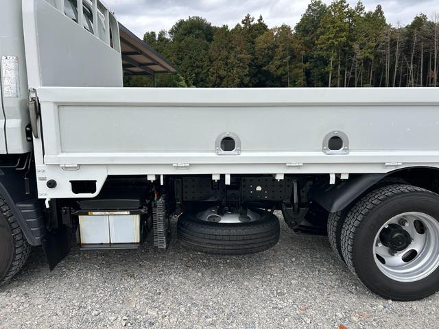 キャンター 全低床　１年保証付き　２ｔ　ＡＴ車　ディーゼルターボ　電動格納ミラー　荷台内寸長さ３１００ｍｍ　幅１６００ｍｍ　ナビ　ＴＶ　ＥＴＣ　坂道発進補助装置付　２トン　２トントラック　平ボディ　荷台鉄板張り　キーレス（63枚目）