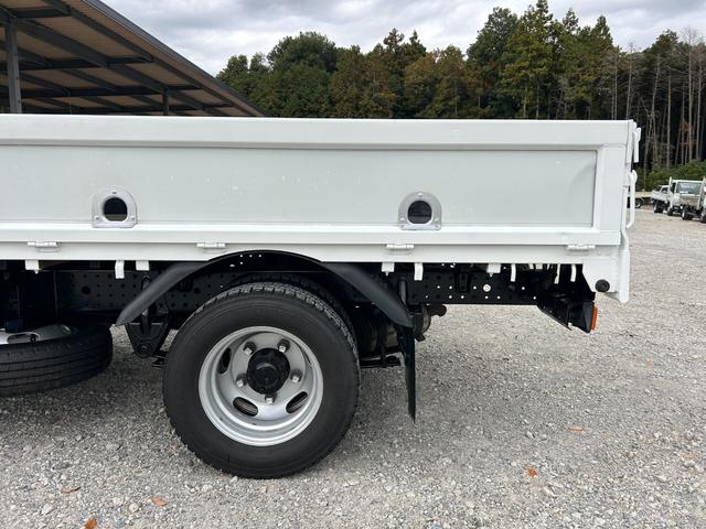 キャンター 全低床　１年保証付き　２ｔ　ＡＴ車　ディーゼルターボ　電動格納ミラー　荷台内寸長さ３１００ｍｍ　幅１６００ｍｍ　ナビ　ＴＶ　ＥＴＣ　坂道発進補助装置付　２トン　２トントラック　平ボディ　荷台鉄板張り　キーレス（65枚目）