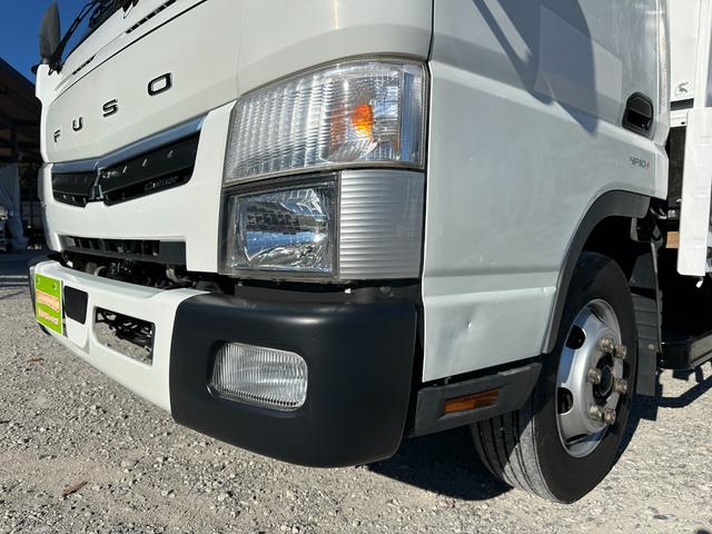 キャンター ワイドキャブロング全低床　１年保証付き　４ｔ　ワイド超ロング　ＡＴ車　バックカメラ　積載量４２５０ｋｇ　荷台内寸　長さ５０００ｍｍ　幅２０８０ｍｍ　荷台鉄板張り　ＥＴＣ　準中型免許対応車　キーレス　４トントラック　ワイドロング（51枚目）