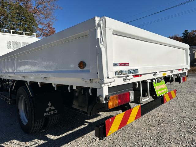 キャンター ワイドキャブロング全低床　１年保証付き　４ｔ　ワイド超ロング　ＡＴ車　バックカメラ　積載量４２５０ｋｇ　荷台内寸　長さ５０００ｍｍ　幅２０８０ｍｍ　荷台鉄板張り　ＥＴＣ　準中型免許対応車　キーレス　４トントラック　ワイドロング（69枚目）