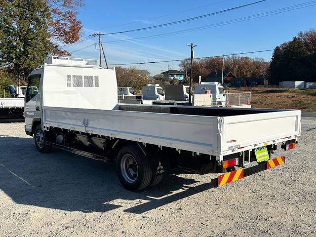 キャンター ワイドキャブロング全低床 1年保証付き 4t ワイド超ロング AT車 ディーゼルターボ 荷台鉄板 ナビ バックカメラ ETC Bluetooth 電格ミラー 坂道発進補助装置 4トン 4トントラック ワイドロング 積載4.2t(7枚目)