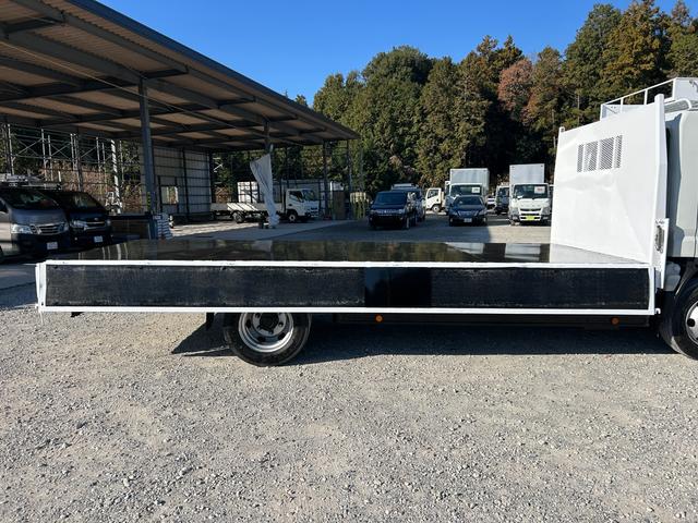 キャンター ワイドキャブロング全低床 1年保証付き 4t ワイド超ロング AT車 ディーゼルターボ 荷台鉄板 ナビ バックカメラ ETC Bluetooth 電格ミラー 坂道発進補助装置 4トン 4トントラック ワイドロング 積載4.2t(39枚目)